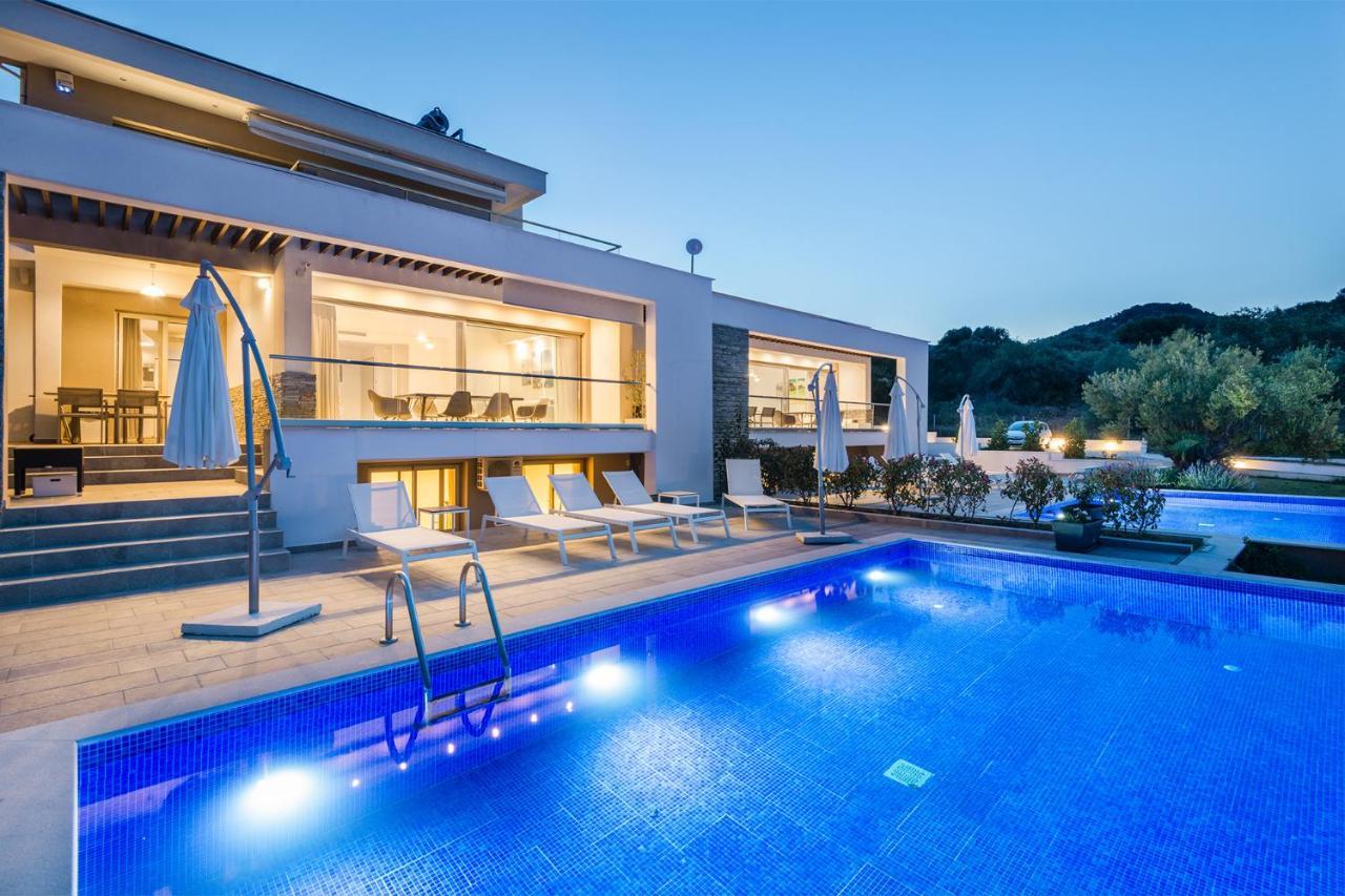 Afisia Villas Sarti Esterno foto