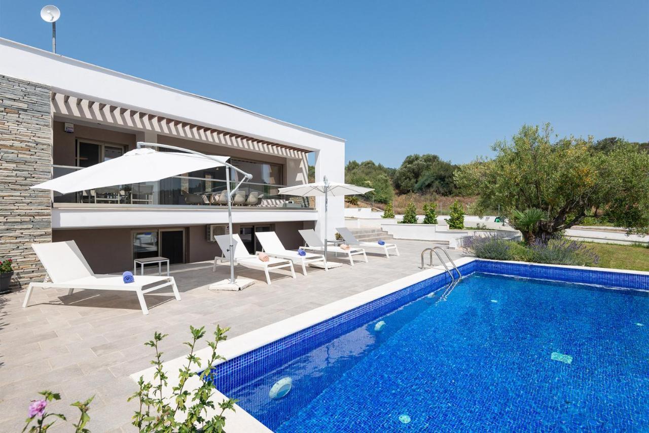 Afisia Villas Sarti Esterno foto