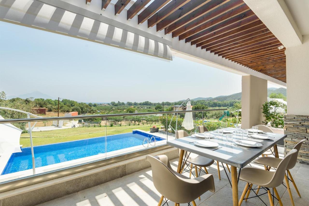 Afisia Villas Sarti Esterno foto